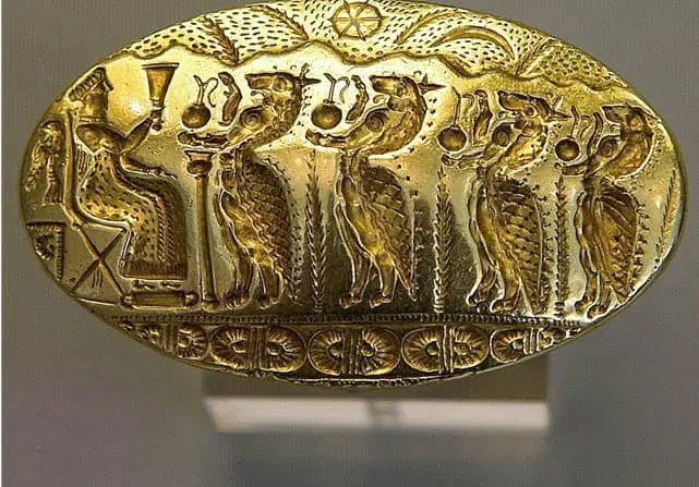A gold ring with Ancient Greek Daimona