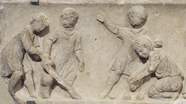 Ancient Roman boys playing football