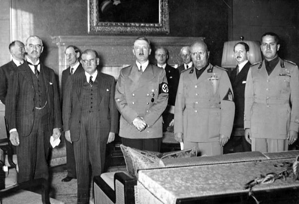 From left to right: Neville Chamberlain, Édouard Daladier, Adolf Hitler, and Benito Mussolini pictured before signing the Munich Agreement
